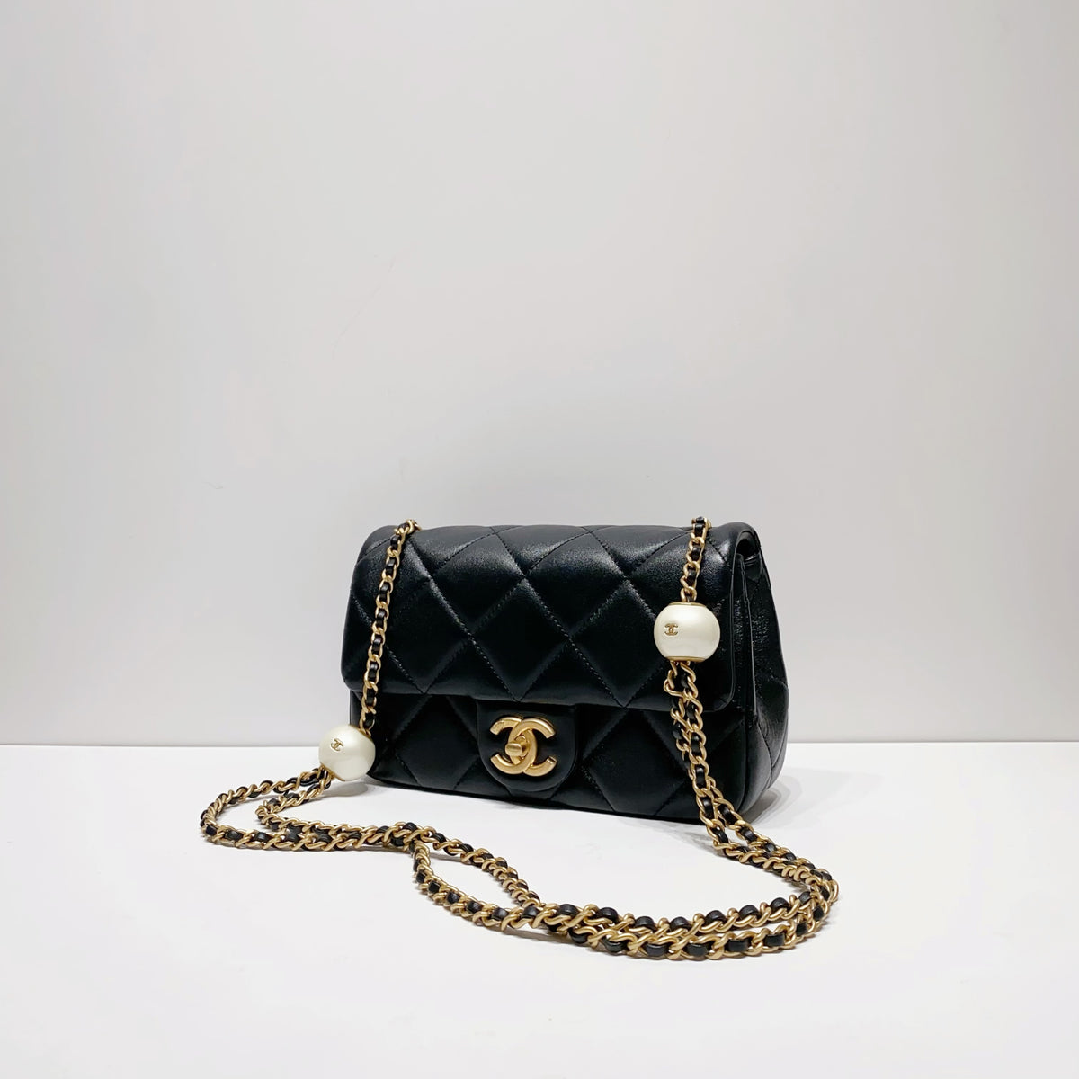 Chanel mini flap bag with pearl chain sale